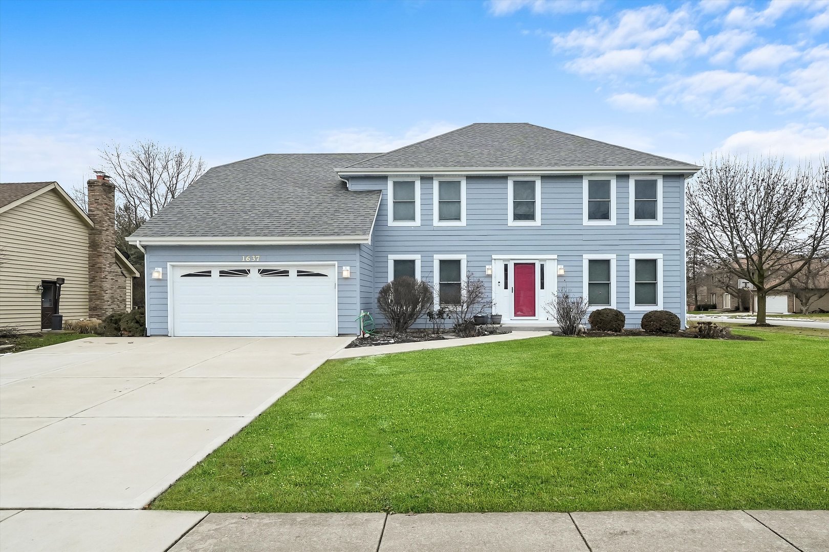 Undisclosed Address Naperville, IL 60563 - Photo 1 of 30 a front view of house with yard and green space