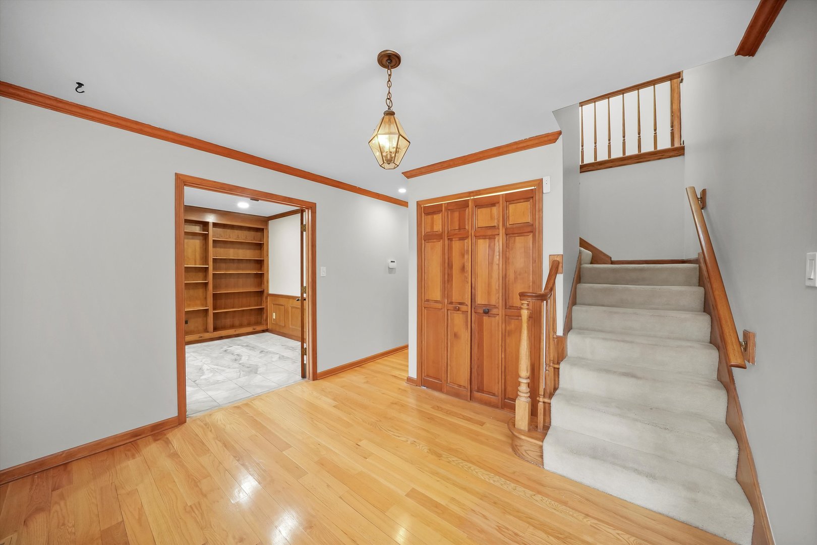 Undisclosed Address Naperville, IL 60563 - Photo 11 of 30 a bedroom with wooden floor closet and a bathroom
