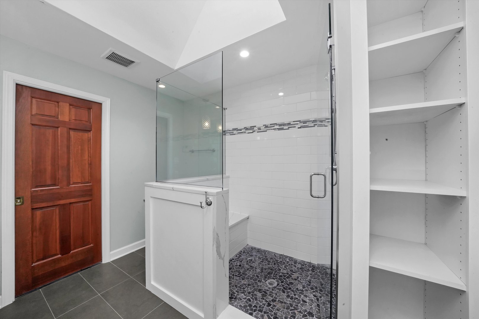 Undisclosed Address Naperville, IL 60563 - Photo 17 of 30 a bathroom with a shower and a sink