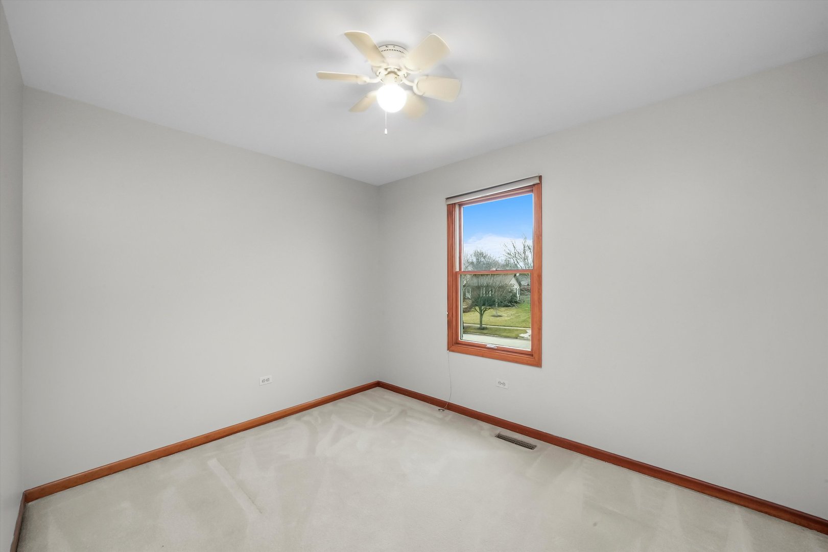 Undisclosed Address Naperville, IL 60563 - Photo 22 of 30 an empty room with a window and a fan