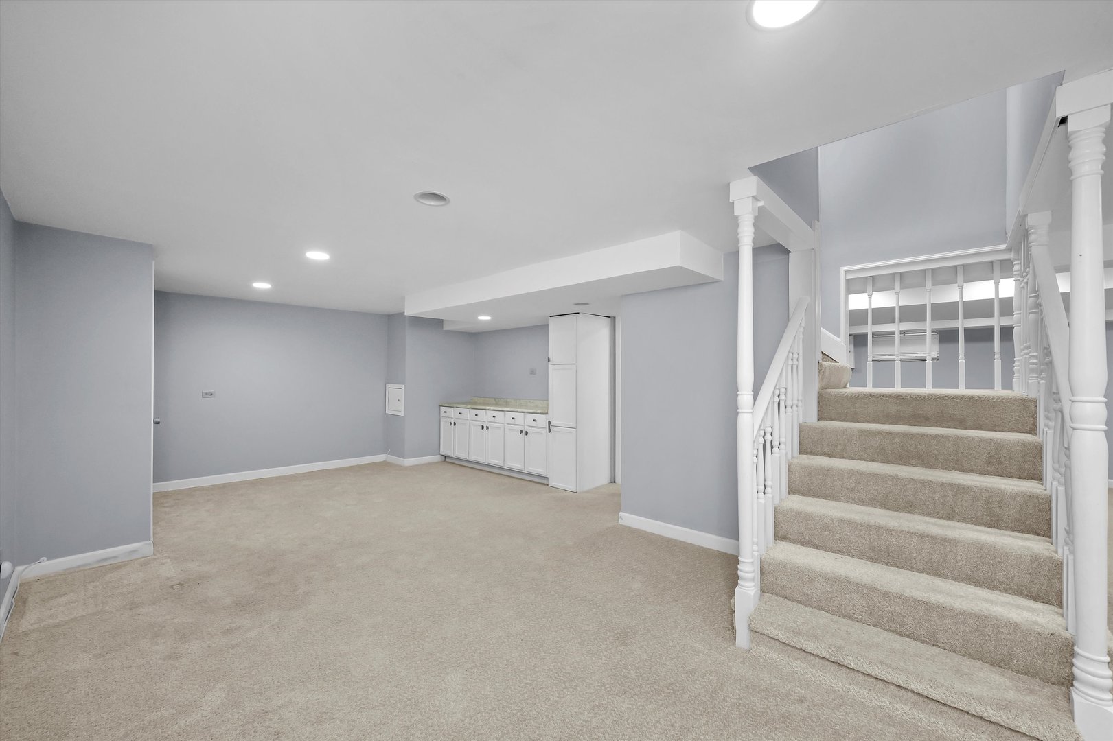 Undisclosed Address Naperville, IL 60563 - Photo 26 of 30 a view of an empty room with stairs and a room