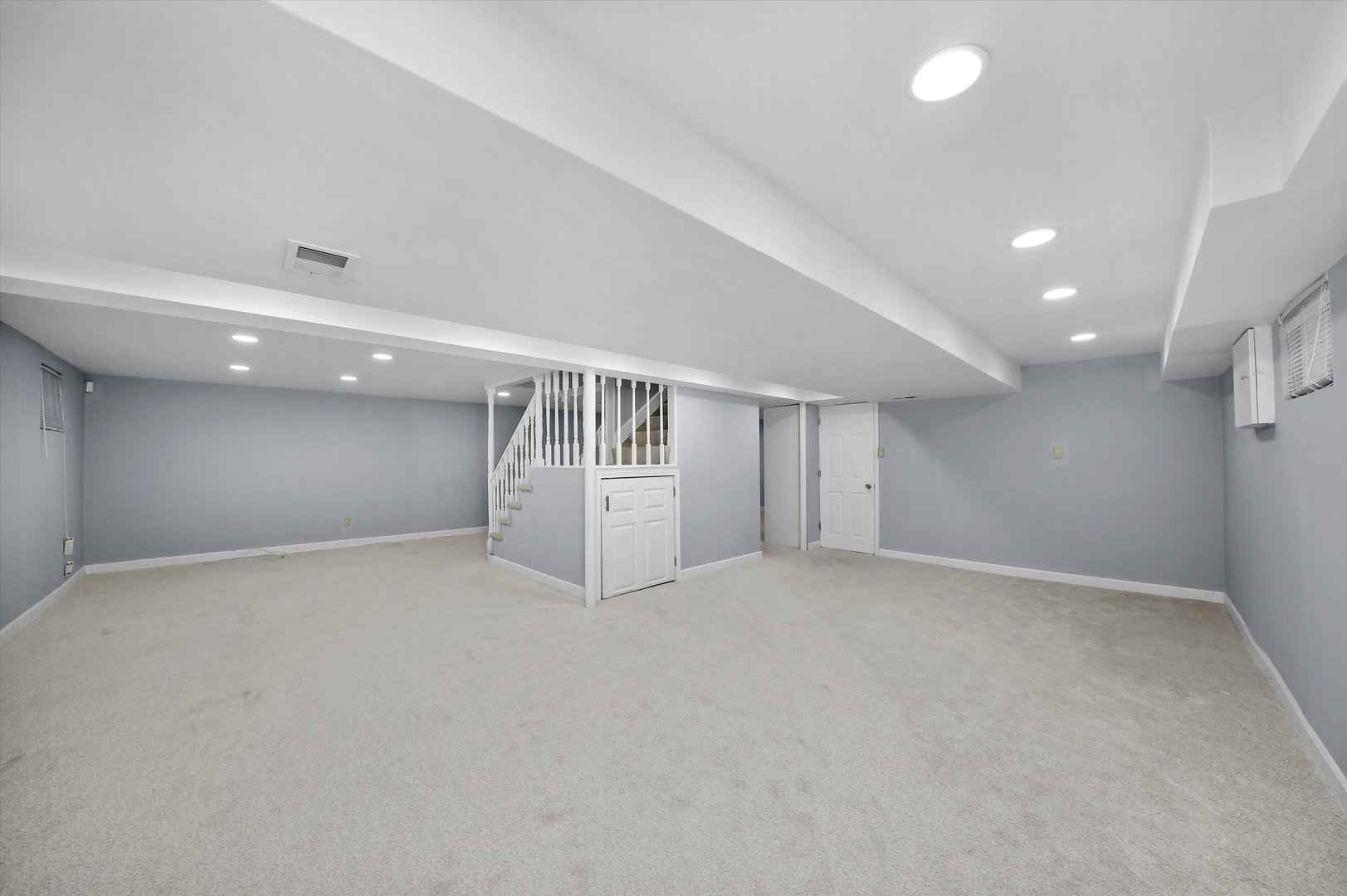 Undisclosed Address Naperville, IL 60563 - Photo 27 of 30 an empty room with staircase and white walls