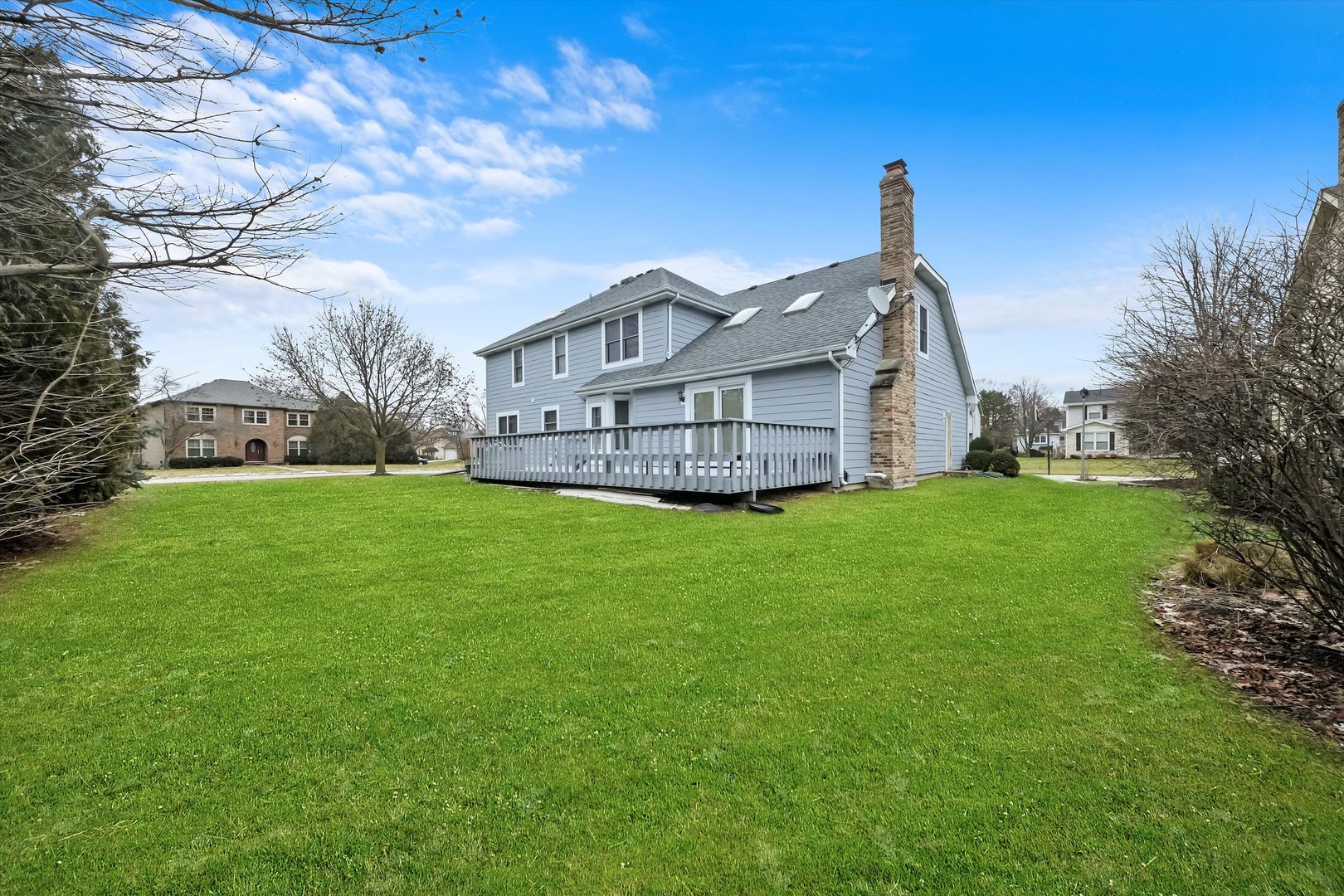 Undisclosed Address Naperville, IL 60563 - Photo 30 of 30 a view of a house with a big yard and large tree
