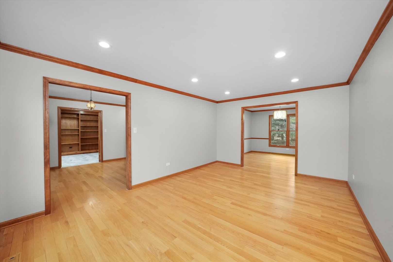 Undisclosed Address Naperville, IL 60563 - Photo 10 of 30 a view of an empty room with wooden floor and closet