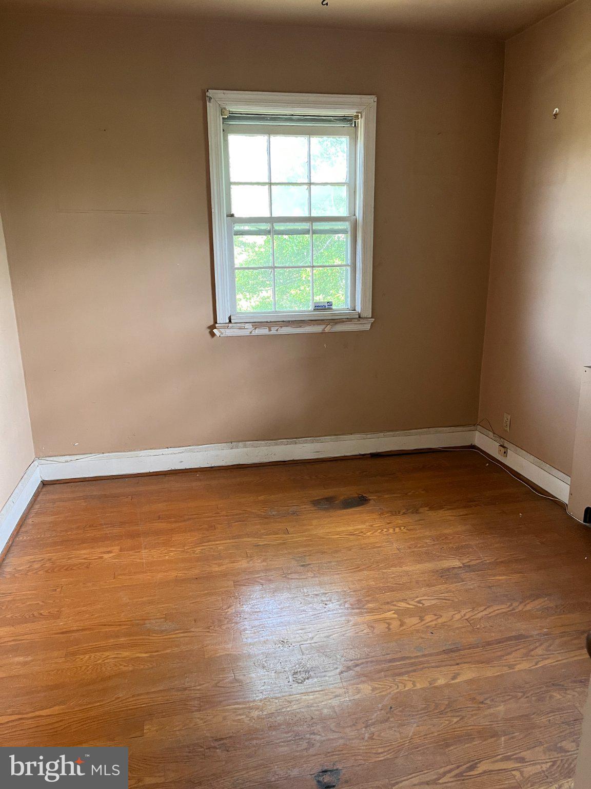 5906 Ayleshire Road Baltimore, MD 21239 - Photo 25 of 41 Third Bedroom with hardwood floors.