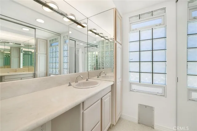 an aerial view of a house with a lake view