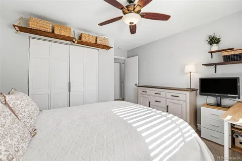 a swimming pool with outdoor seating and yard