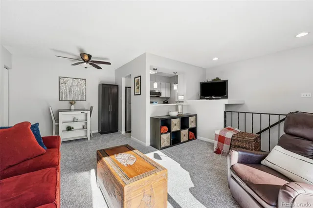 a kitchen with stainless steel appliances a refrigerator a stove a microwave and cabinets