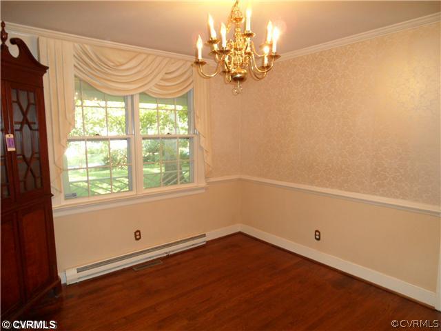 2651 Radstock Road Midlothian, VA 23113 - Photo 3 of 12 a view of a room that has a window and wooden floor