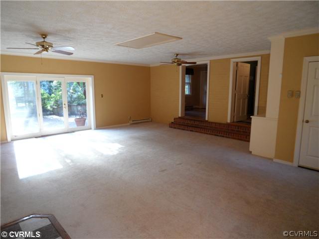 2651 Radstock Road Midlothian, VA 23113 - Photo 8 of 12 a view of a livingroom with a staircase