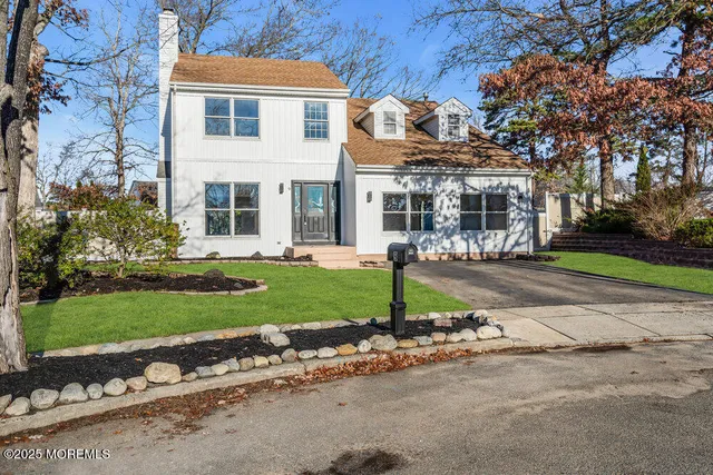 a view of livingroom with furniture and a fireplace
