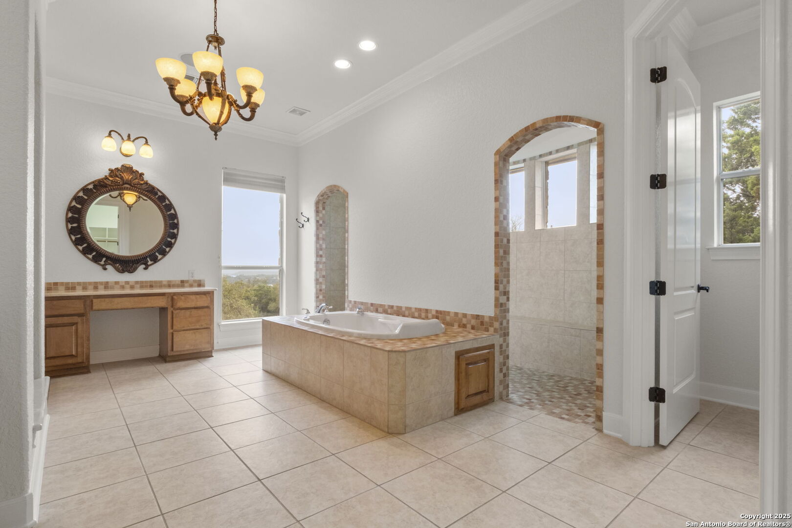 1069 Fawn River Drive Spring Branch, TX 78070 - Photo 13 of 25 a kitchen with stainless steel appliances granite countertop a stove a sink and a refrigerator