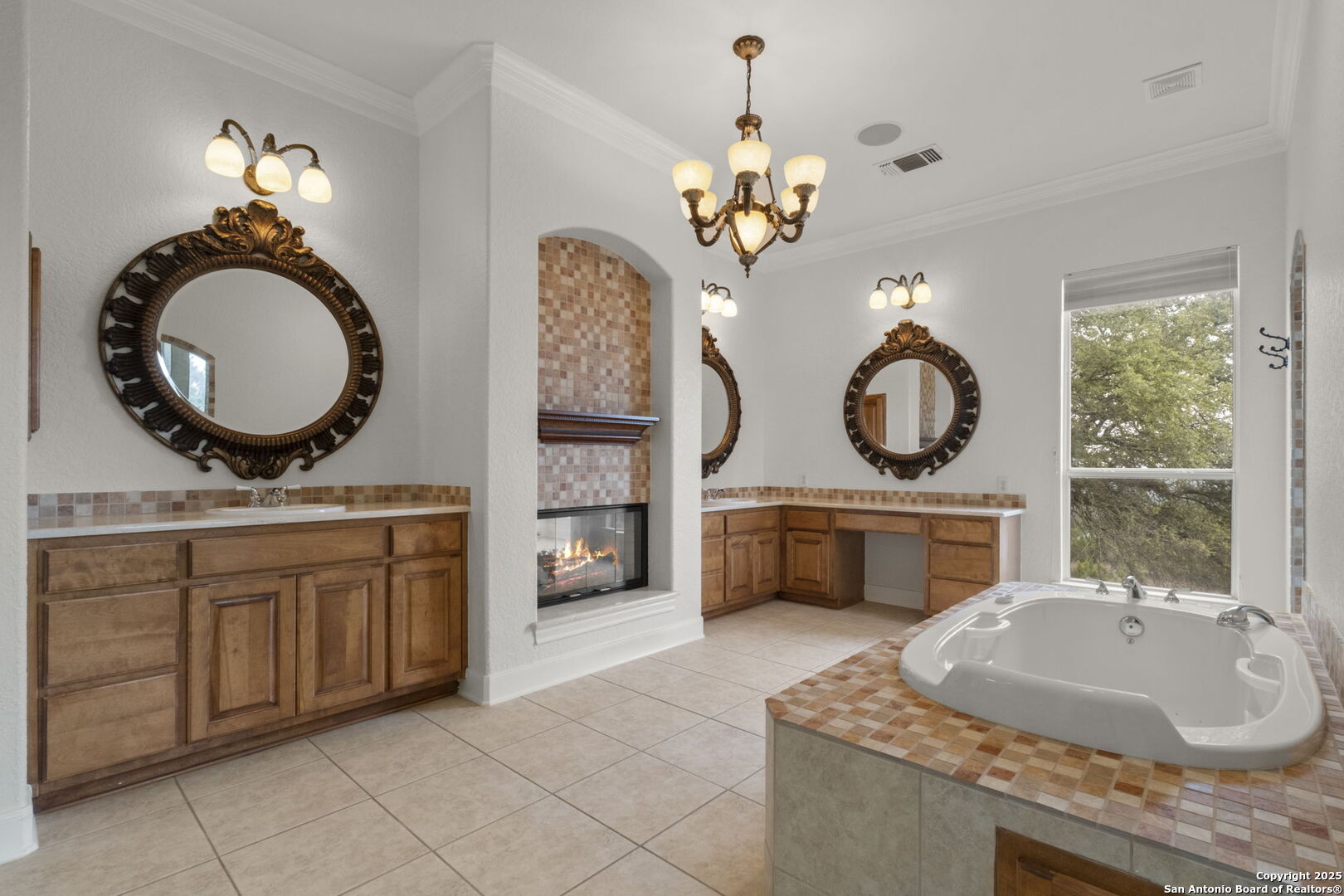 1069 Fawn River Drive Spring Branch, TX 78070 - Photo 14 of 25 a bathroom with a granite countertop sink mirror and vanity
