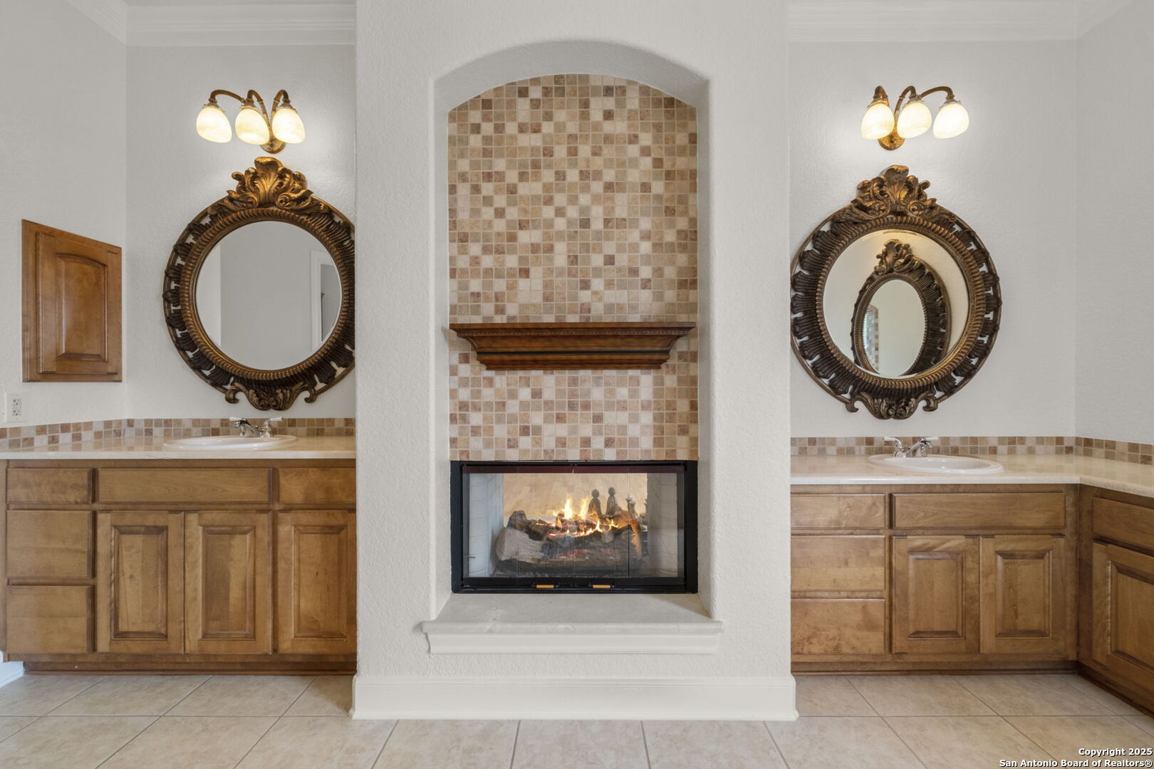 1069 Fawn River Drive Spring Branch, TX 78070 - Photo 16 of 25 a bathroom with a sink and a mirror
