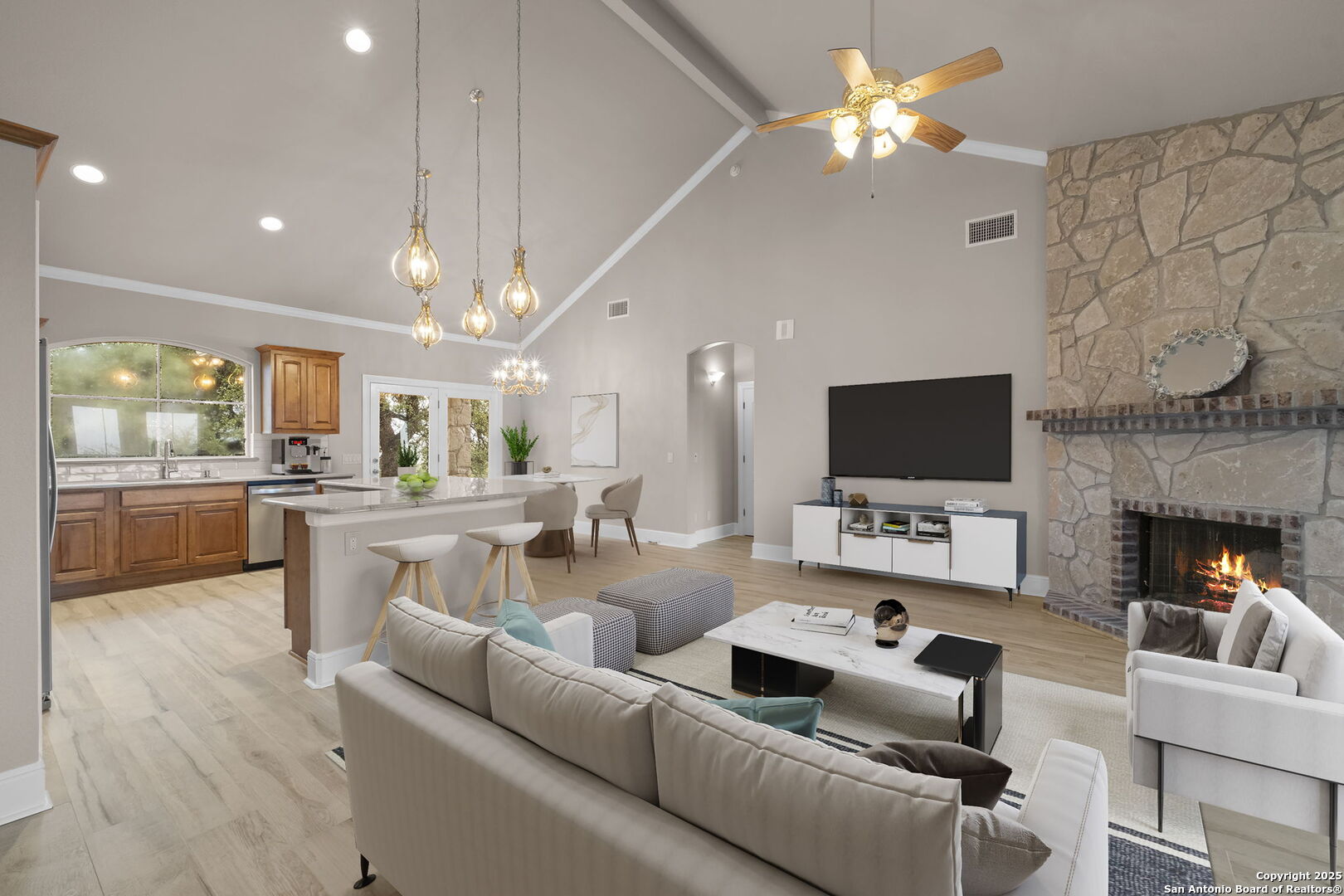 1069 Fawn River Drive Spring Branch, TX 78070 - Photo 18 of 25 a living room with furniture a flat screen tv and a fireplace