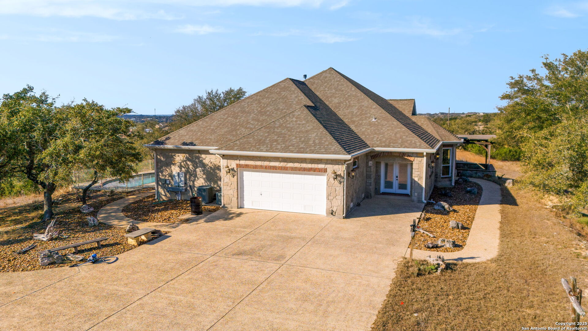 1069 Fawn River Drive Spring Branch, TX 78070 - Photo 25 of 25 a view of house with yard and staircase