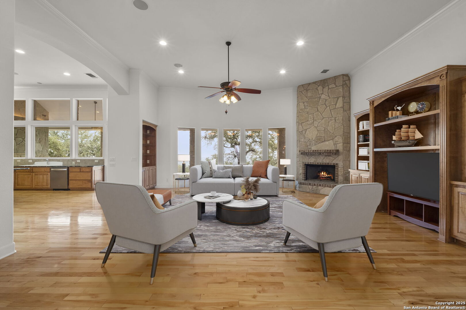 1069 Fawn River Drive Spring Branch, TX 78070 - Photo 8 of 25 a living room with fireplace furniture and a large window