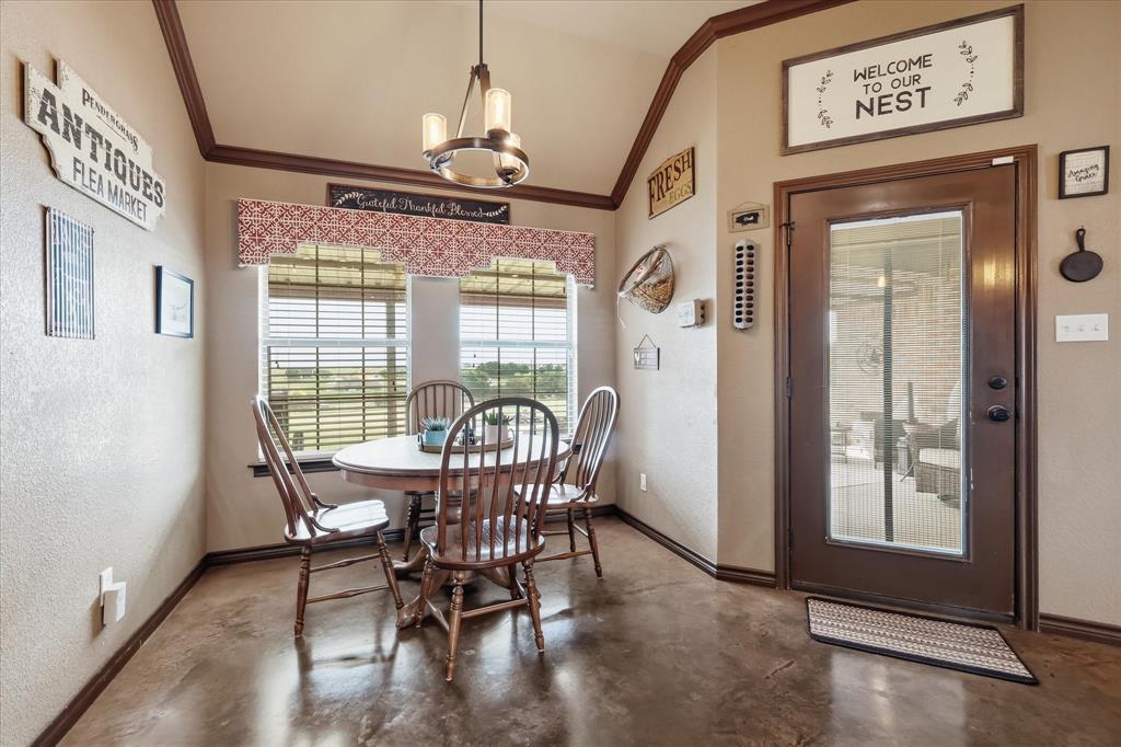 171 Ridge Top Drive Decatur, TX 76234 - Photo 11 of 40 a view of a dining room with furniture window and outside view