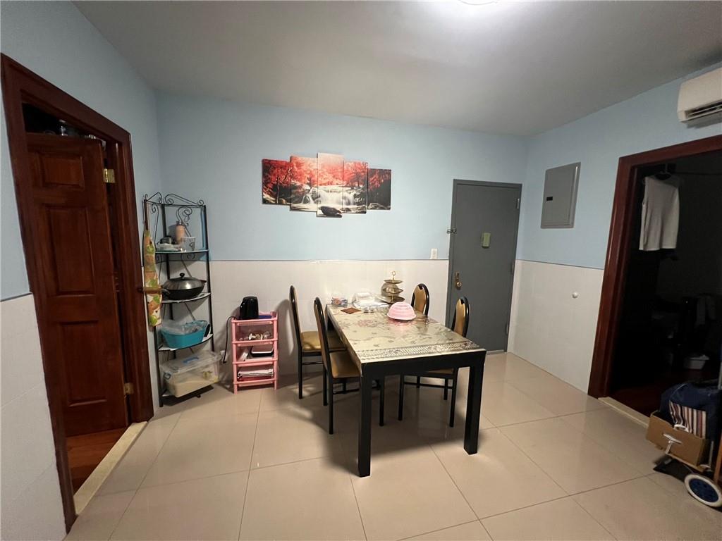 6710 13th Avenue Brooklyn, NY 11219 - Photo 3 of 9 a view of a workspace with furniture