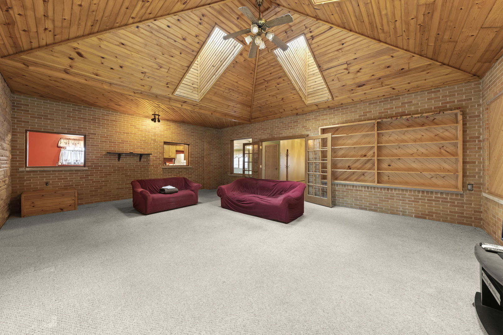 27257 South Scheer Road Manhattan, IL 60442 - Photo 12 of 41 a spacious bedroom with a bed and a chandelier