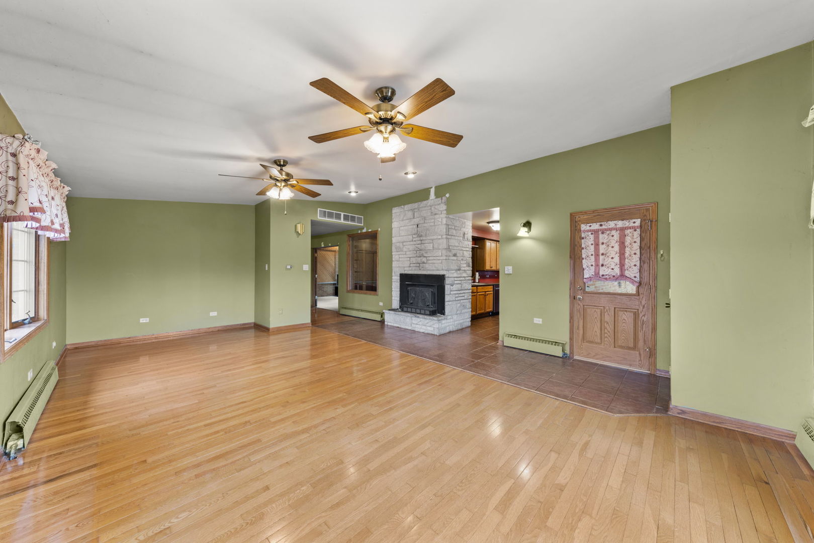 27257 South Scheer Road Manhattan, IL 60442 - Photo 13 of 41 a view of an empty room with window and chandelier fan