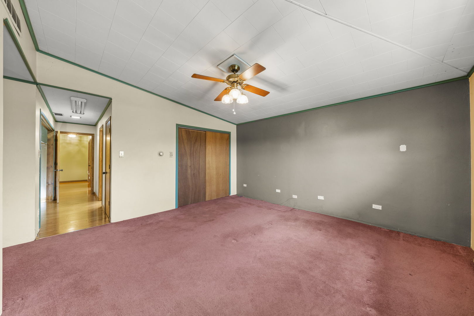 27257 South Scheer Road Manhattan, IL 60442 - Photo 15 of 41 a view of a big room with windows and chandelier fan