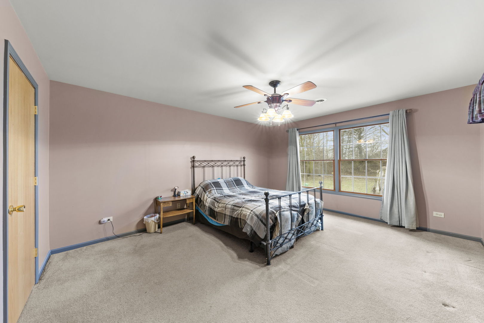 27257 South Scheer Road Manhattan, IL 60442 - Photo 22 of 41 a bed sitting in a spacious bedroom next to a window