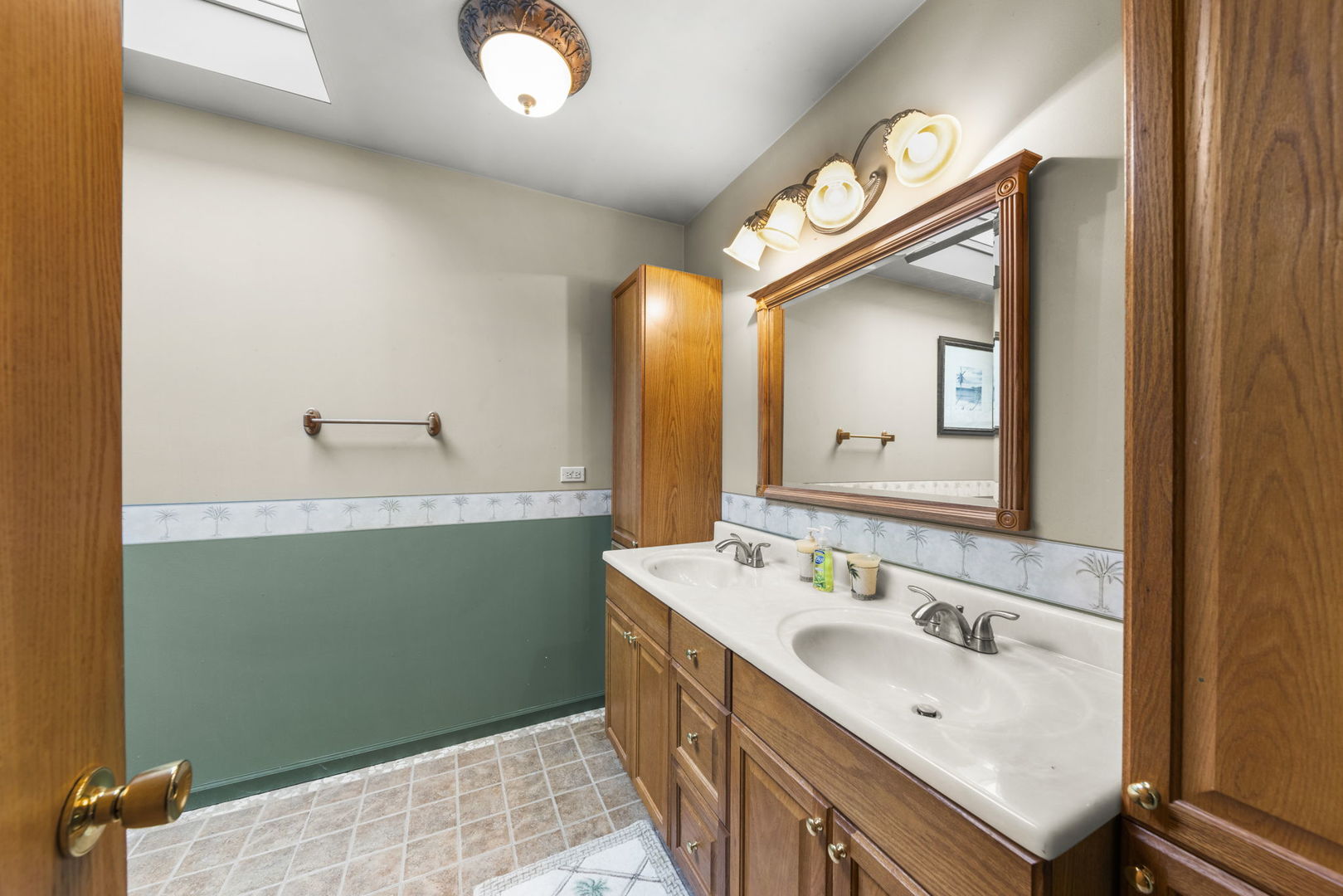 27257 South Scheer Road Manhattan, IL 60442 - Photo 27 of 41 a bathroom with a sink and a mirror