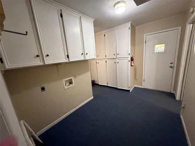a bathroom with a sink toilet and mirror