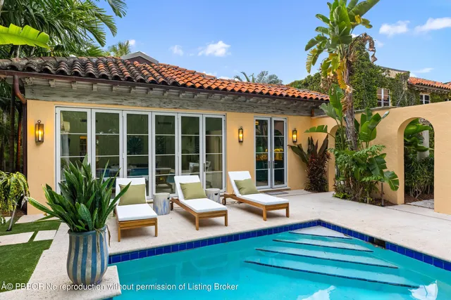 a view of swimming pool with lounge chair