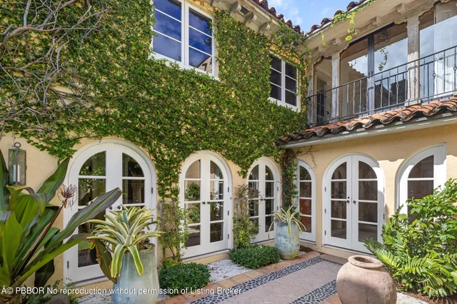 a view of a building with a yard