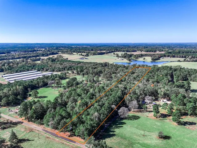 an aerial view of a city with lots of residential buildings