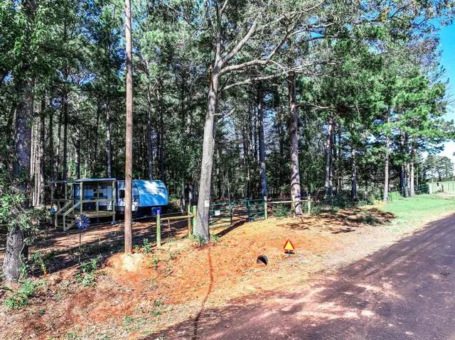 a view of a park with swings and slides