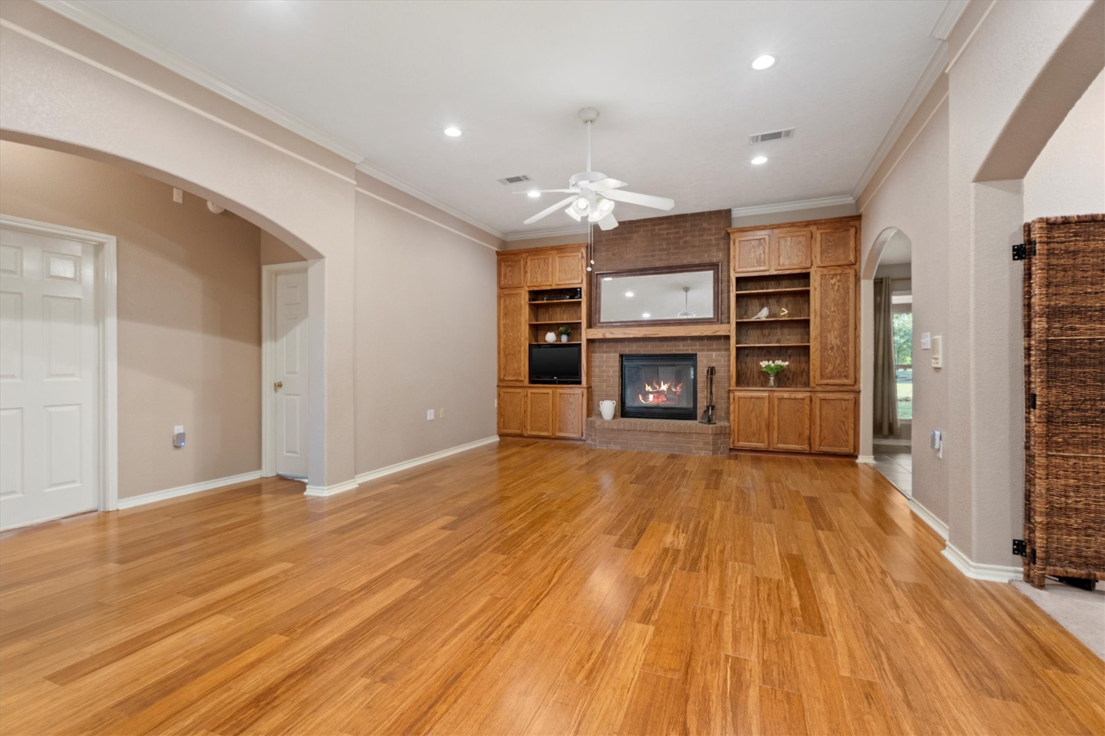 10205 Fostoria Road Cleveland, TX 77328 - Photo 15 of 41 Family Room with Fireplace and built-ins