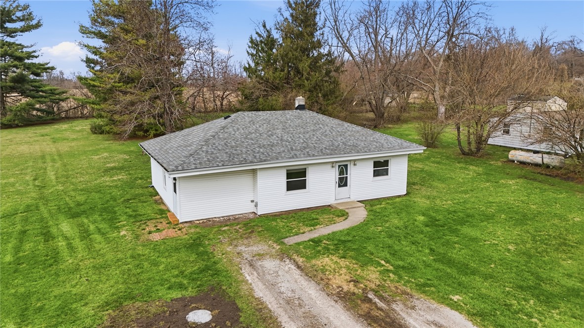1166 West Sparrow Road Springfield, OH 45502 - Photo 1 of 40 This charming residence offers a peaceful retreat with a spacious yard, perfect for outdoor enjoyment.