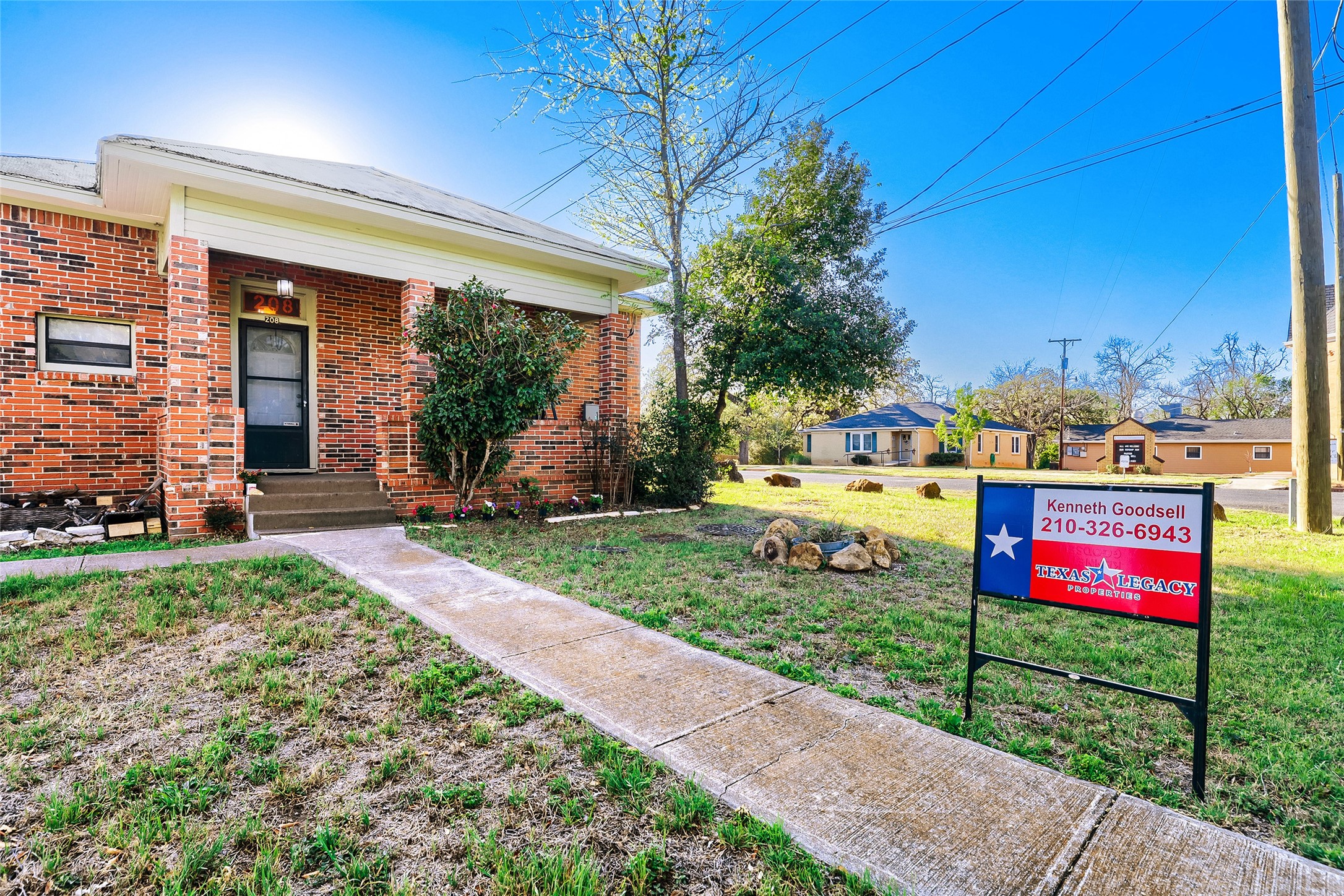 208 North Ave B Elgin, TX 78621 - Photo 4 of 29 a view of a house with a backyard