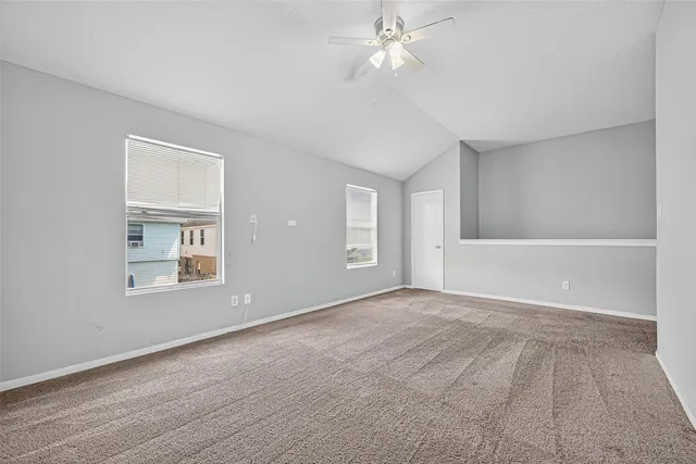 a view of a house with backyard