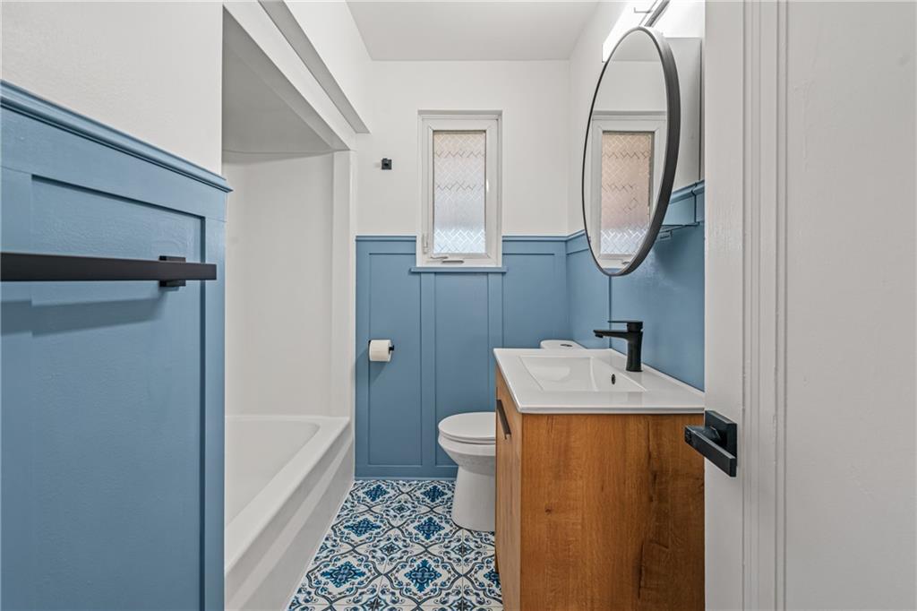 213 Scene Ridge Road McKeesport, PA 15133 - Photo 11 of 22 a bathroom with a sink toilet and shower