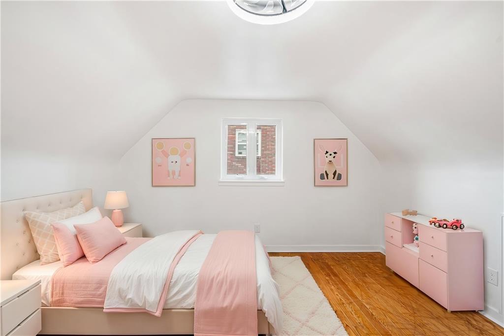 213 Scene Ridge Road McKeesport, PA 15133 - Photo 13 of 22 a bedroom with a bed and painting on the wall