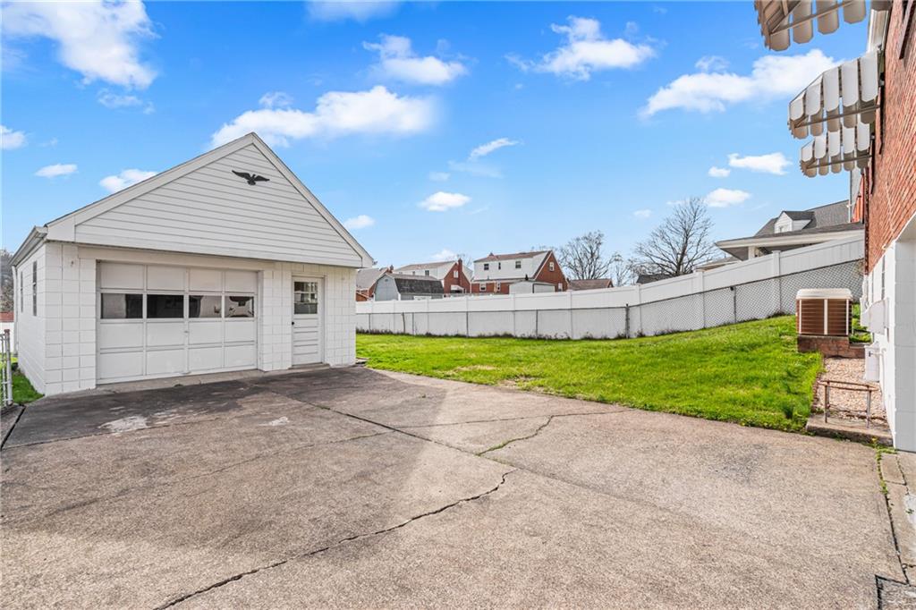 213 Scene Ridge Road McKeesport, PA 15133 - Photo 19 of 22 a view of a house with a yard