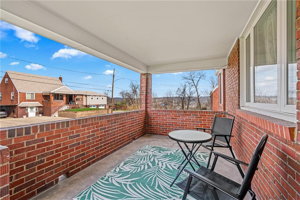213 Scene Ridge Road McKeesport, PA 15133 - Photo 3 of 22 a view of a porch with furniture