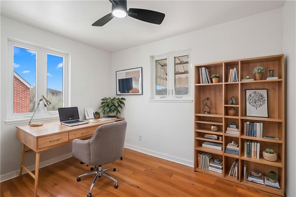 213 Scene Ridge Road McKeesport, PA 15133 - Photo 10 of 22 a workspace with furniture window and wooden floor