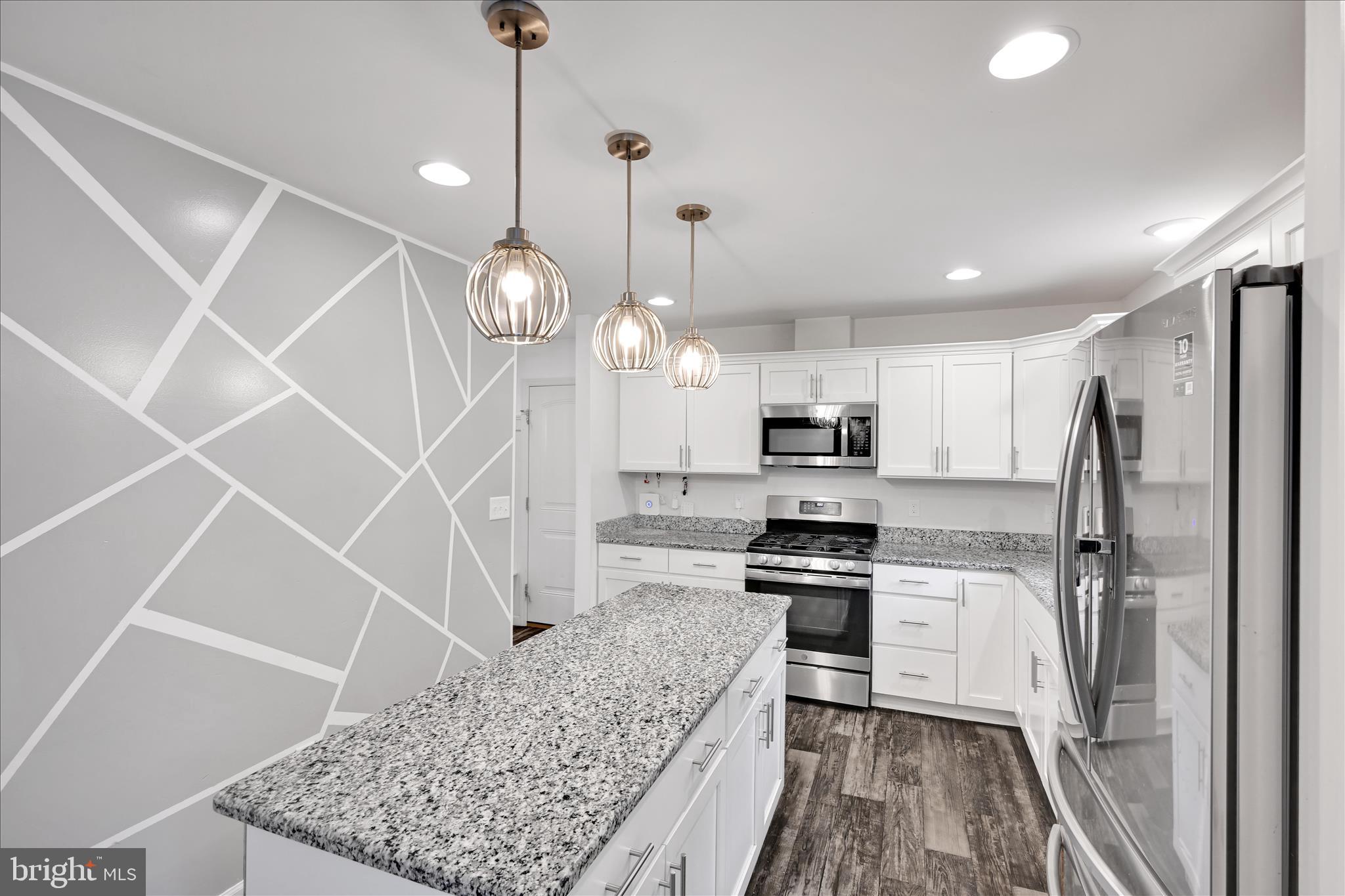 1485 Graystone Road Manheim, PA 17545 - Photo 14 of 43 a kitchen with stainless steel appliances granite countertop a refrigerator a oven and a sink