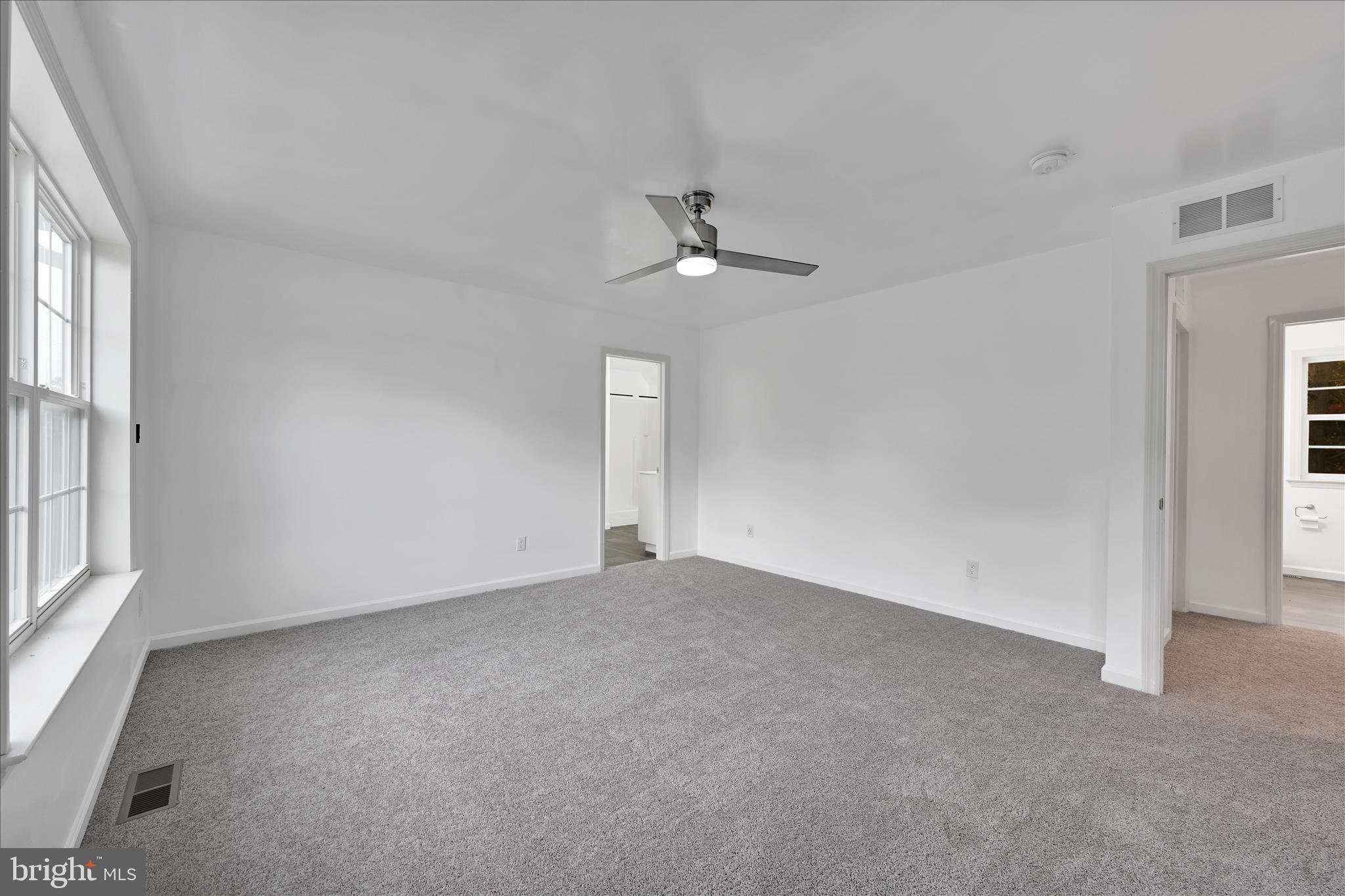 1485 Graystone Road Manheim, PA 17545 - Photo 28 of 43 an empty room with a window and a ceiling fan