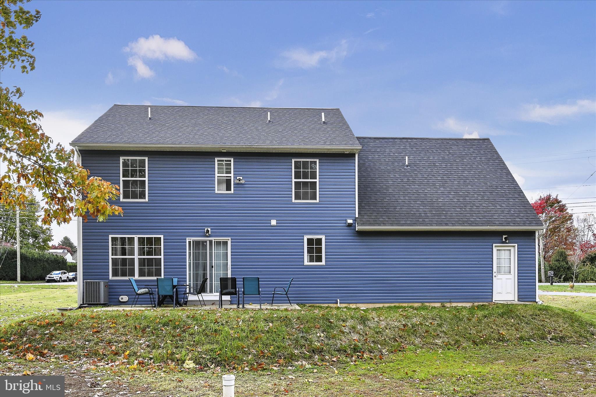 1485 Graystone Road Manheim, PA 17545 - Photo 34 of 43 a brick house with a yard in front of it