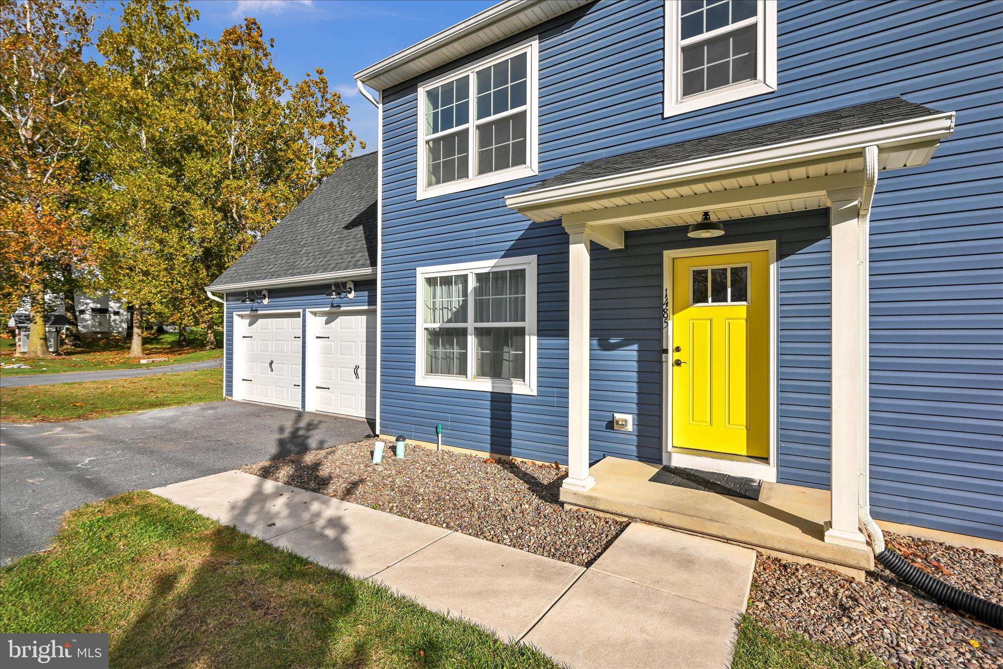 1485 Graystone Road Manheim, PA 17545 - Photo 7 of 43 a front view of a house with a yard