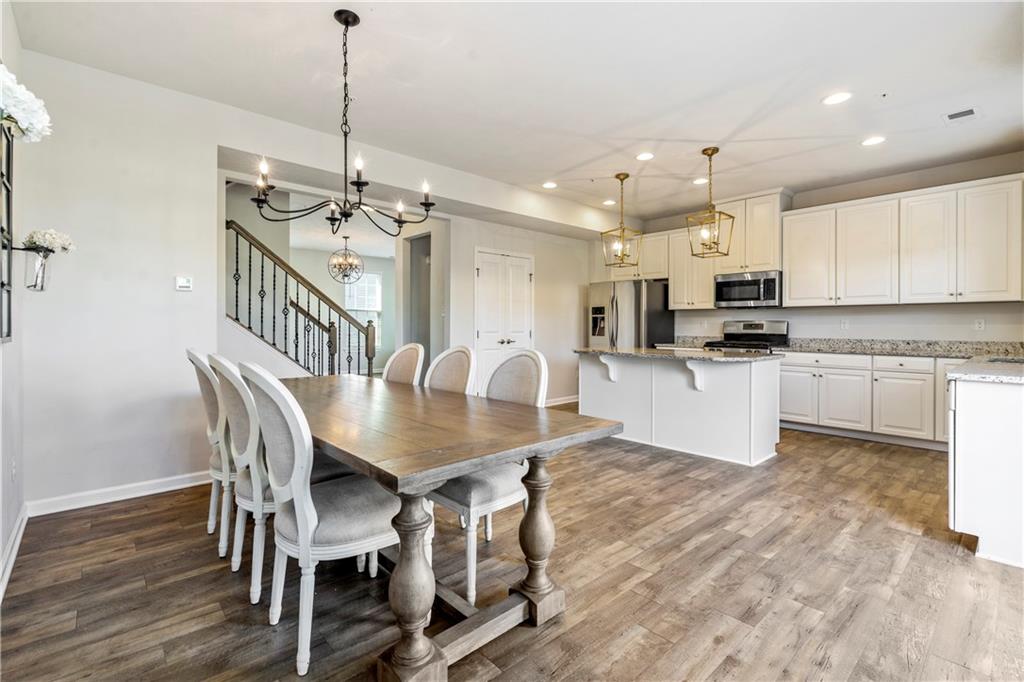 104 Pointe View Drive Mars, PA 16046 - Photo 11 of 25 a view of kitchen with granite countertop cabinets table and chairs