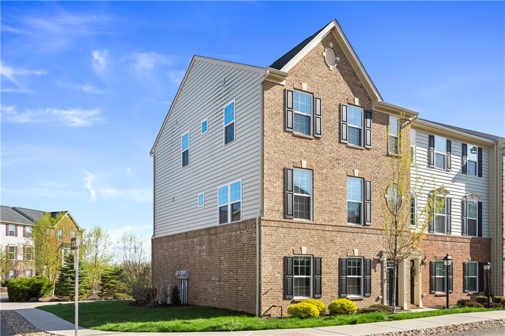 104 Pointe View Drive Mars, PA 16046 - Photo 2 of 25 a front view of a house with garden
