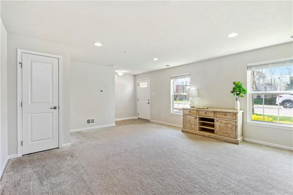 104 Pointe View Drive Mars, PA 16046 - Photo 23 of 25 an empty room with windows and furniture