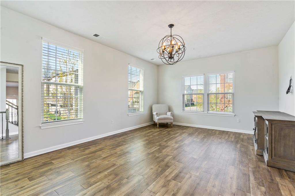 104 Pointe View Drive Mars, PA 16046 - Photo 6 of 25 an empty room with wooden floor and window